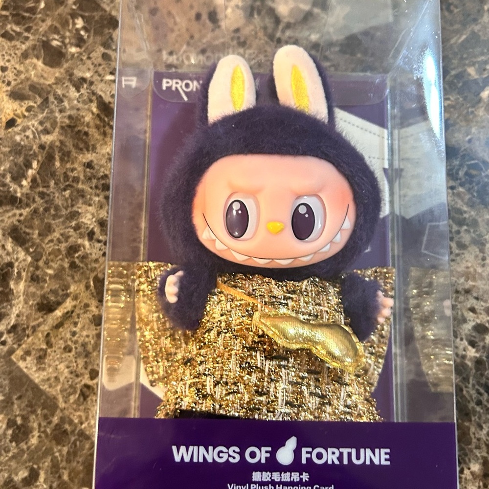 Wings of Fortune Vinyl Figure with Gold Outfit